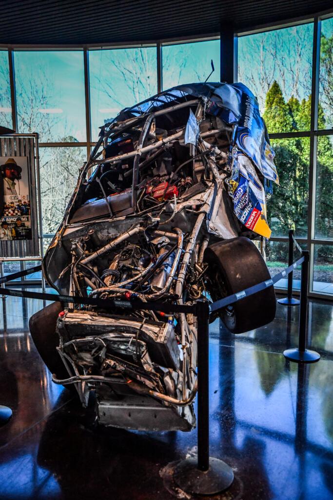 damaged race car on display